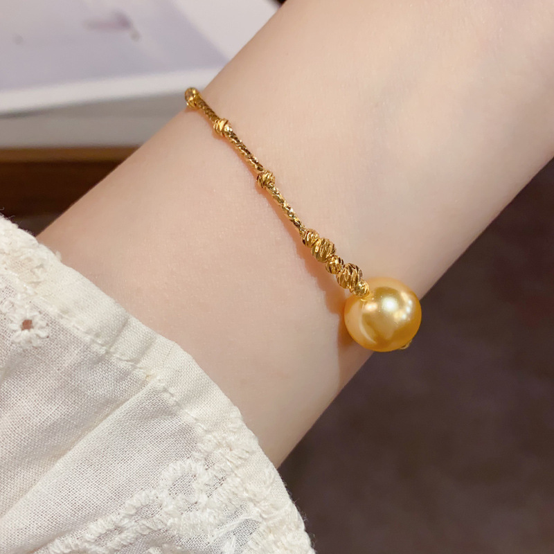 French light luxury style champagne-colored pearl stick chain bracelet, niche fashion, simple design sense, versatile bracelet wholesale