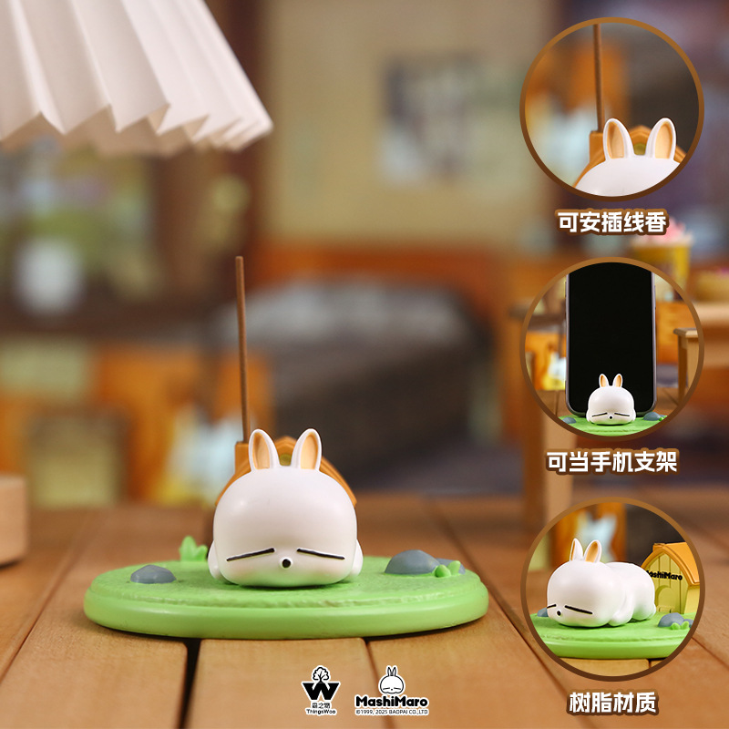 Cartoon Rogue Rabbit mobile phone stand ornament, a Douyin hit Rogue multi-purpose mobile phone stand creative stand ornament Application Scenario