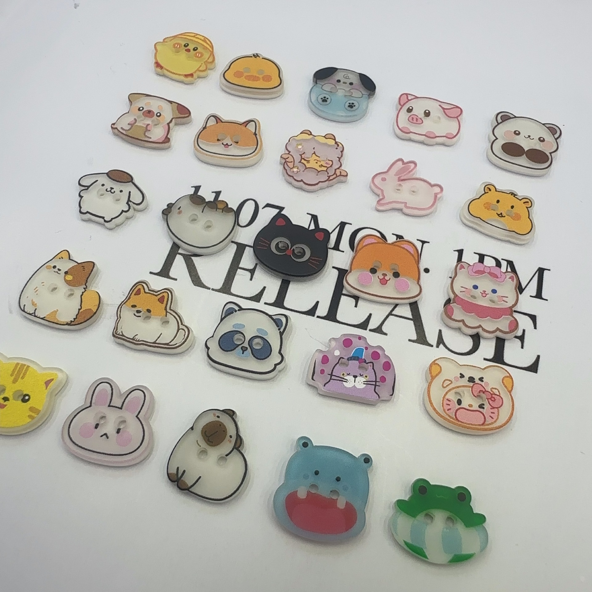 A set of 10 cartoon-patterned metal four-piece buttons, disc buttons and sleeve buttons details Picture