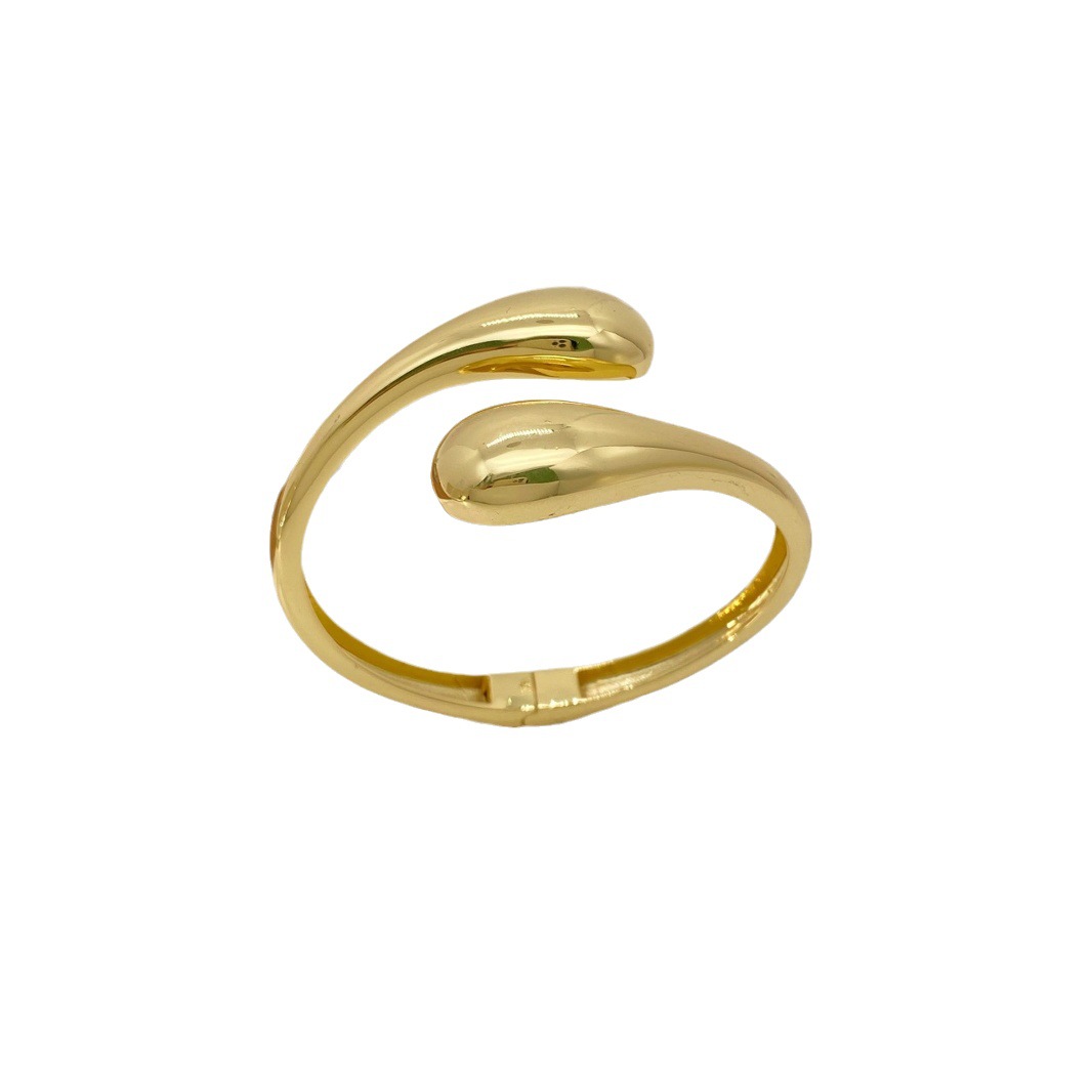 A new best-selling European and American fashion commuting simple teardrop-shaped smooth bracelet for women with gold and silver openings, a light luxury high-end accessory Item Picture