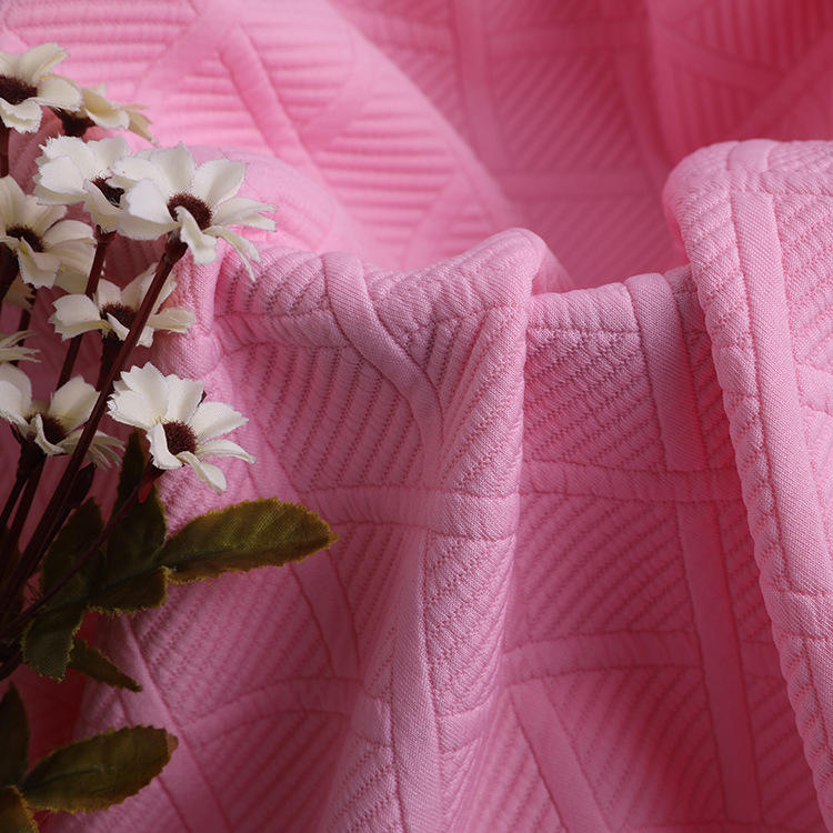 The manufacturer supplies all-polyester knitted jacquard elastic air layer knitted fabric, cotton-like polyester yarn weft dyed fabric details Picture