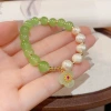 Spring new style, stylish and elegant, new Chinese-style freshwater pearl lotus beaded bracelet, light luxury and versatile, fresh and delicate jewelry Application Scenario