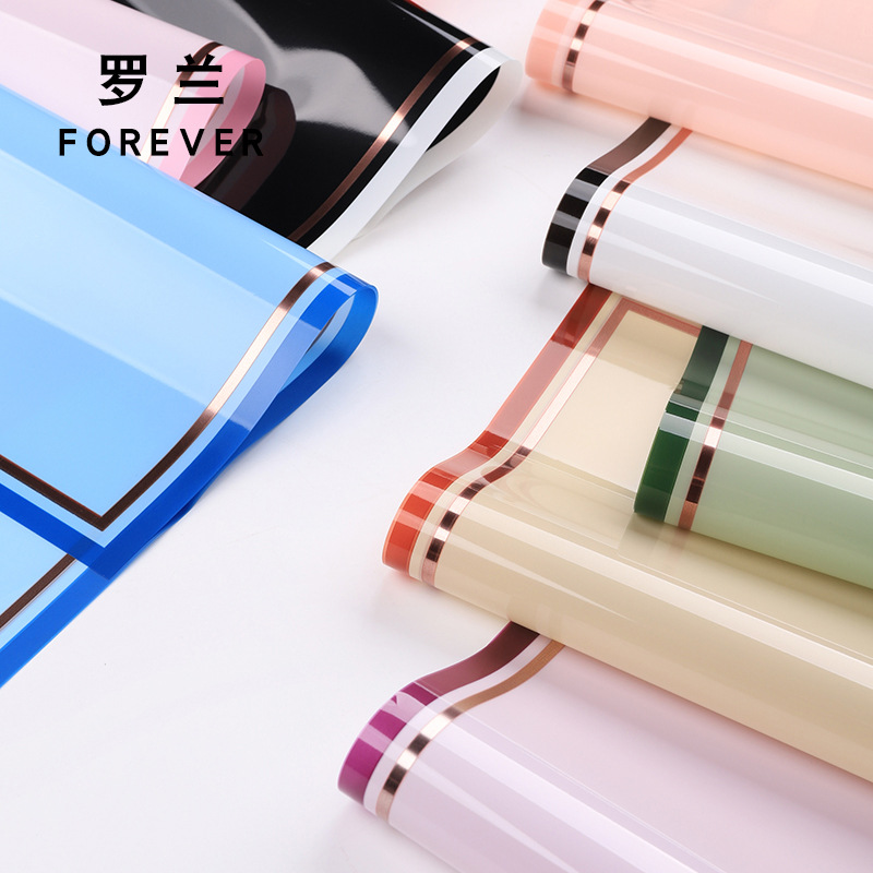 罗兰 烫金世界之窗鲜花包装纸防水opp膜礼物花店花束包花材料批发细节图