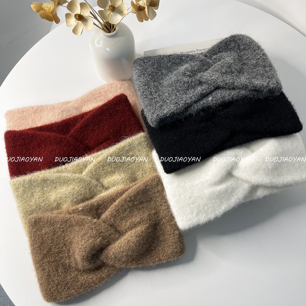 The new retro cross-knitted woolen hair for autumn and winter features a wide band, soft and high-end feel, warmth, windproof, forehead protection and feminine charm Application Scenario