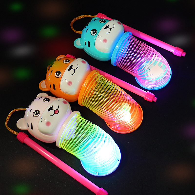 Tiger Year hand-held lantern Rainbow Ring 2022 Cartoon Tiger Glowing Elastic Rainbow Ring Spring Ring Toy wholesale Application Scenario