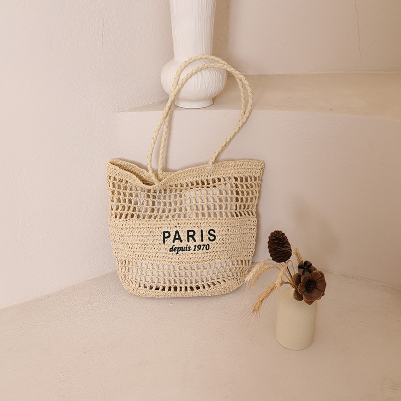 Factory direct sales of single-shoulder tote straw woven bags, new niche letter-hollowed-out woven bags, women's beach vacation bags Item Picture