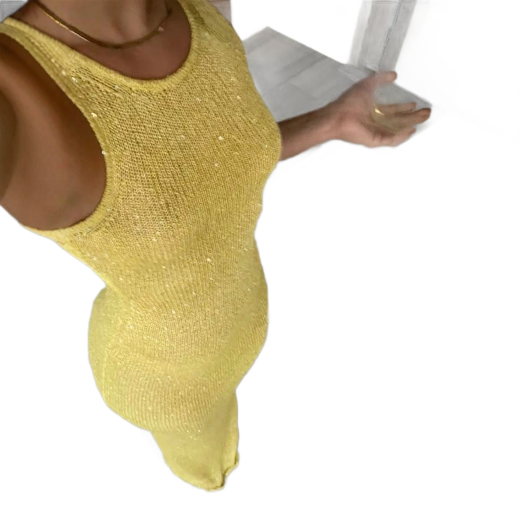 This is a popular cross-border yellow knitted dress for women from Europe and America. It is a summer figure-hugging sequined dress with a vacation style and a fashionable touch Item Picture