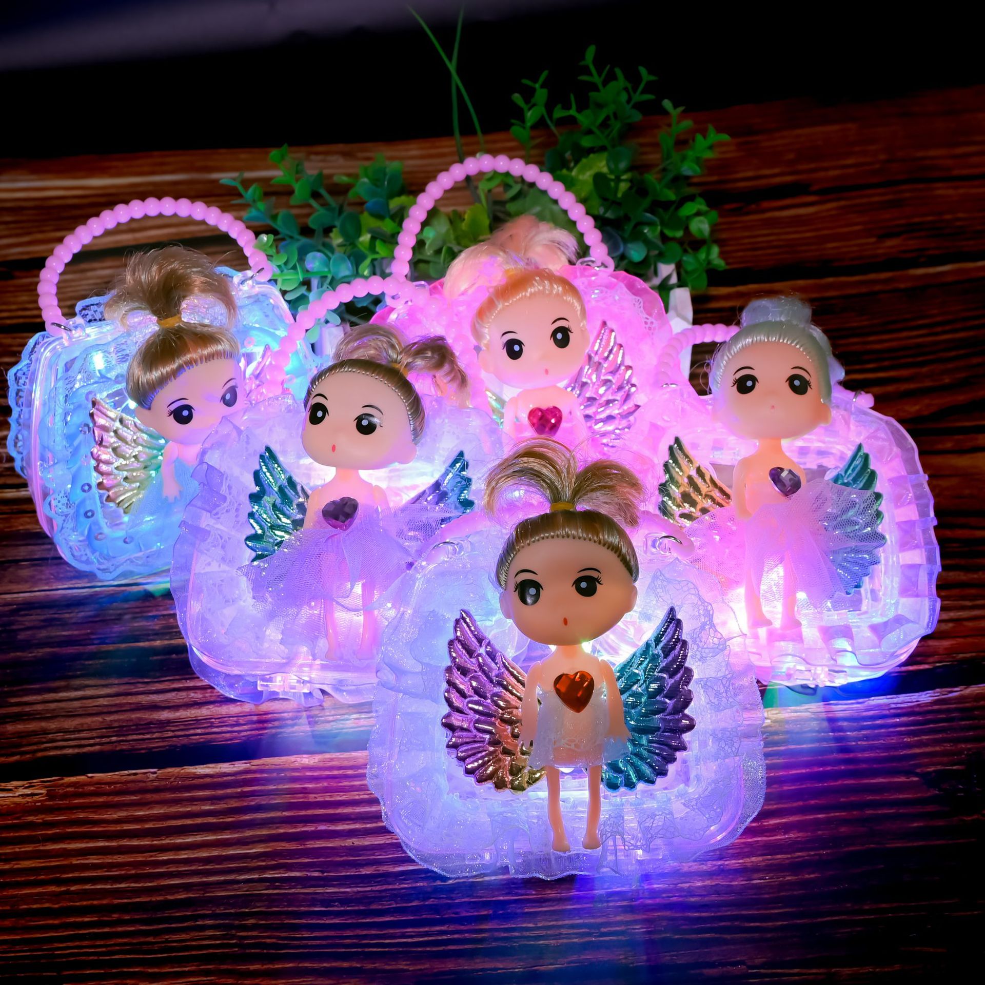 Hand-held angel wing doll lanterns, glowing Internet celebrity toys, cute birthday gifts for girls, wholesale at night market stalls