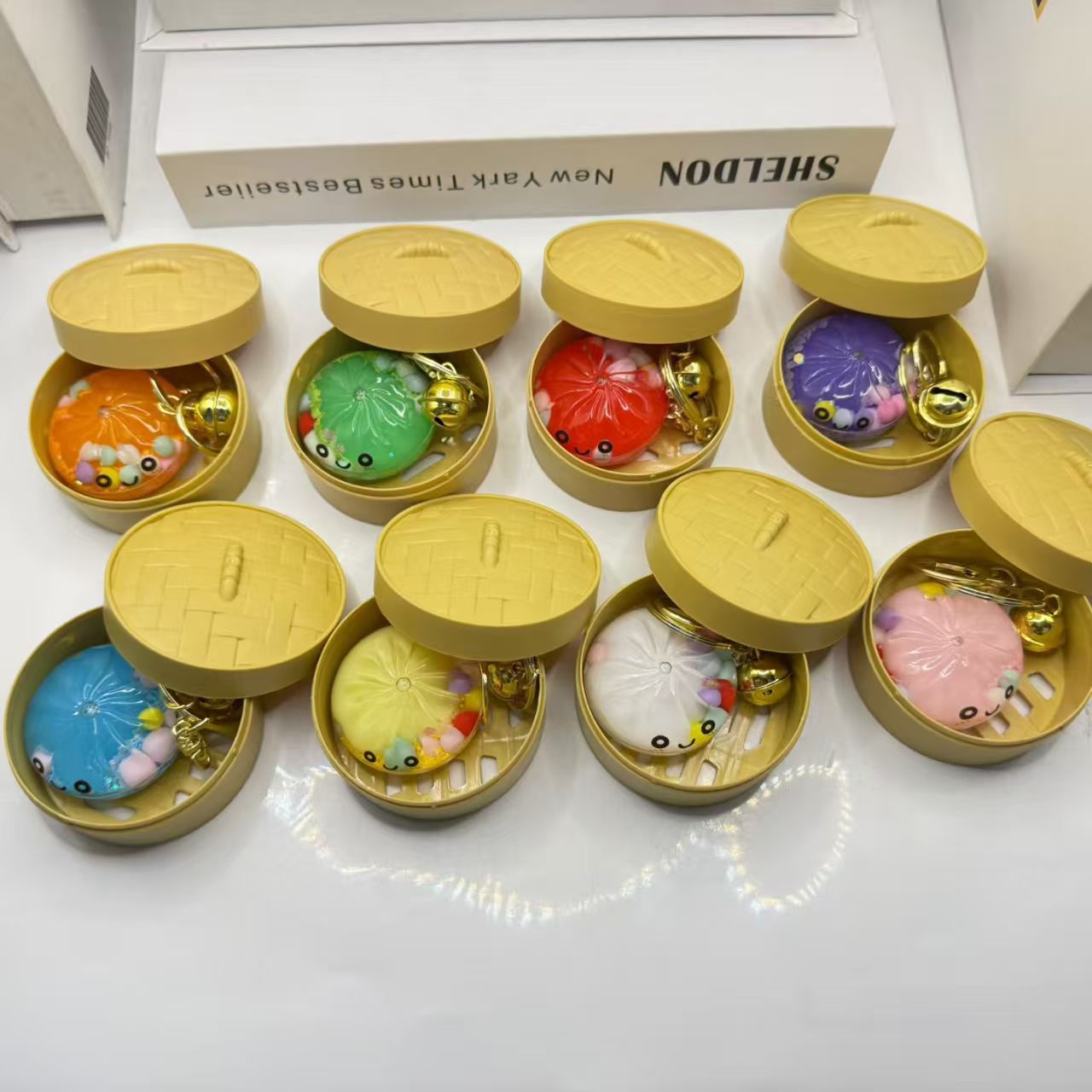 Stress-relieving steamed buns keychain pendants, fun acrylic expressions, Xiaolongbao blind boxes, realistic and cute little toy ornaments Application Scenario