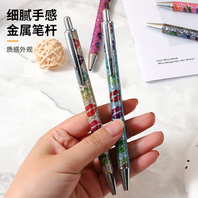 The 2023 color new type of metal ballpoint pen with lip print for the foreskin ballpoint pen and oil pen Specification drawing