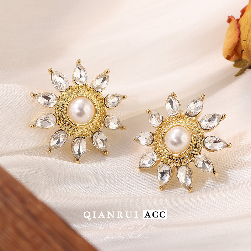 The s925 silver needle sunflower stud earrings are a bestseller, featuring fresh sun, flower and pearl minimalist earrings that exude a feminine charm