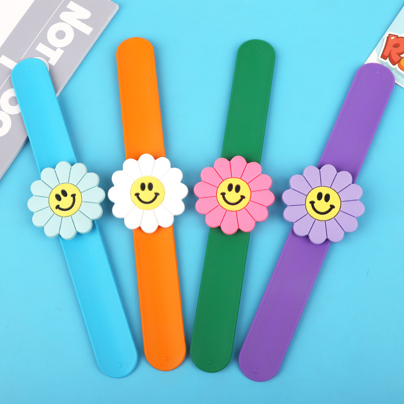 新款卡通硅胶笑脸太阳花啪啪圈 彩色可爱花朵玩具儿童手环小雏菊