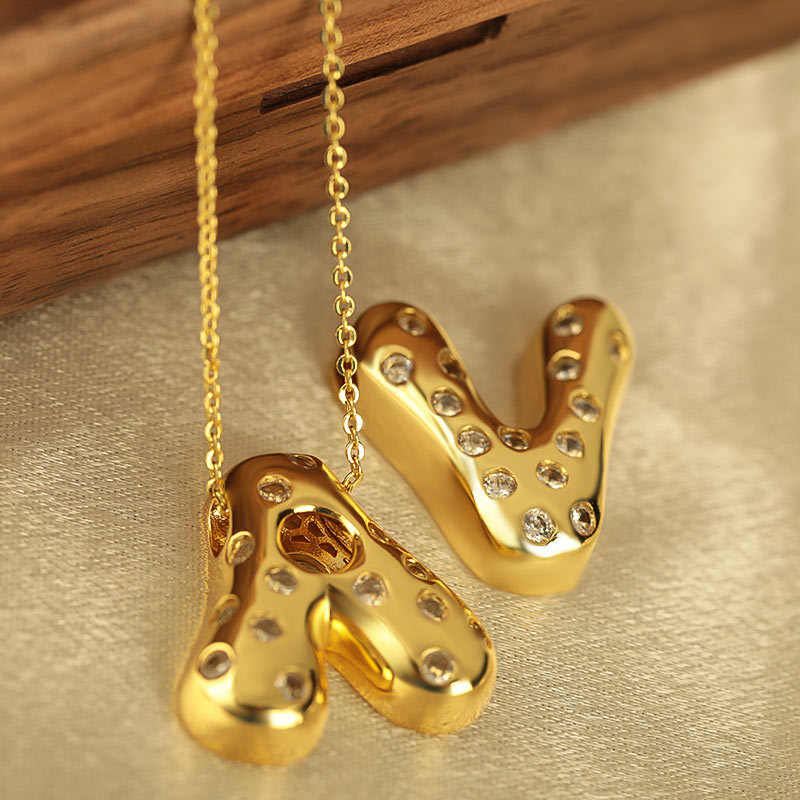 Wholesale of a new cross-border copper-inset zircon 26-piece digital pendant box chain, a personalized and versatile double-sided digital necklace Application Scenario