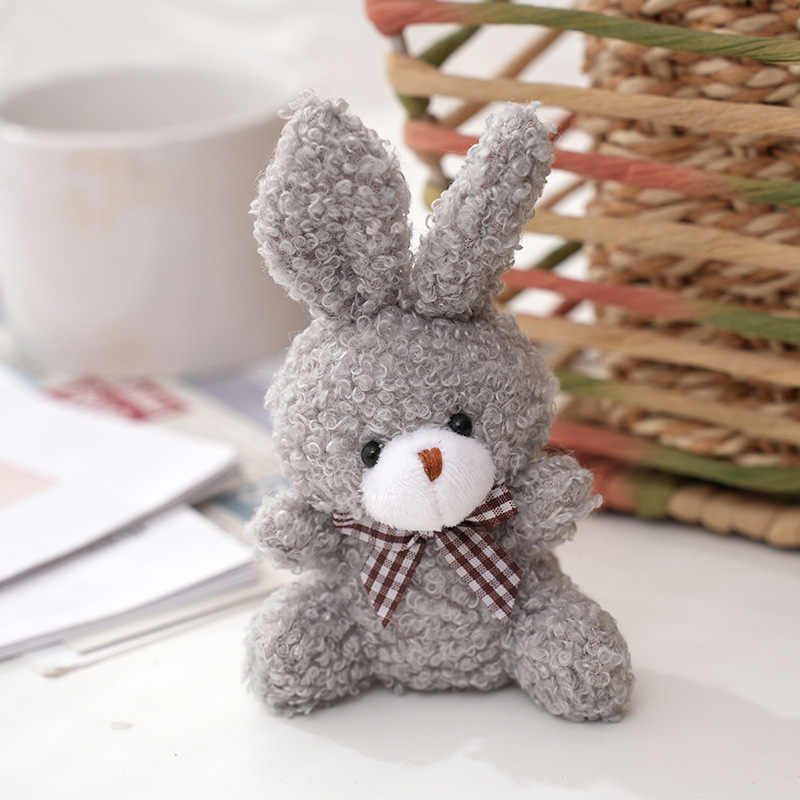 Wholesale of cartoon cute bow tie sitting little rabbit figurines, children's toys, plush pendants, backpacks, keychains and dolls details Picture