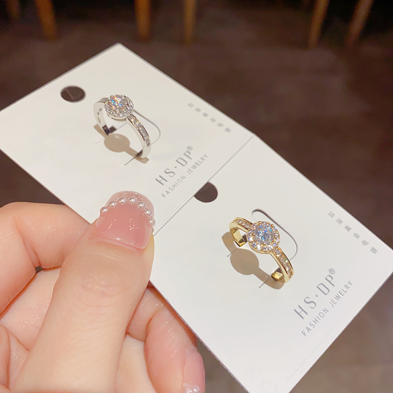 This light luxury, high-end, elegant and refined zircon open ring is a unique and fashionable jewelry accessory with a niche design for women