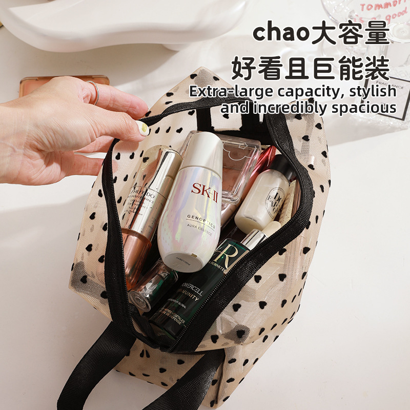 New heart-shaped makeup bag, hand-held large-capacity mesh storage bag, women's Instagram-style portable travel small toiletry bag details Picture