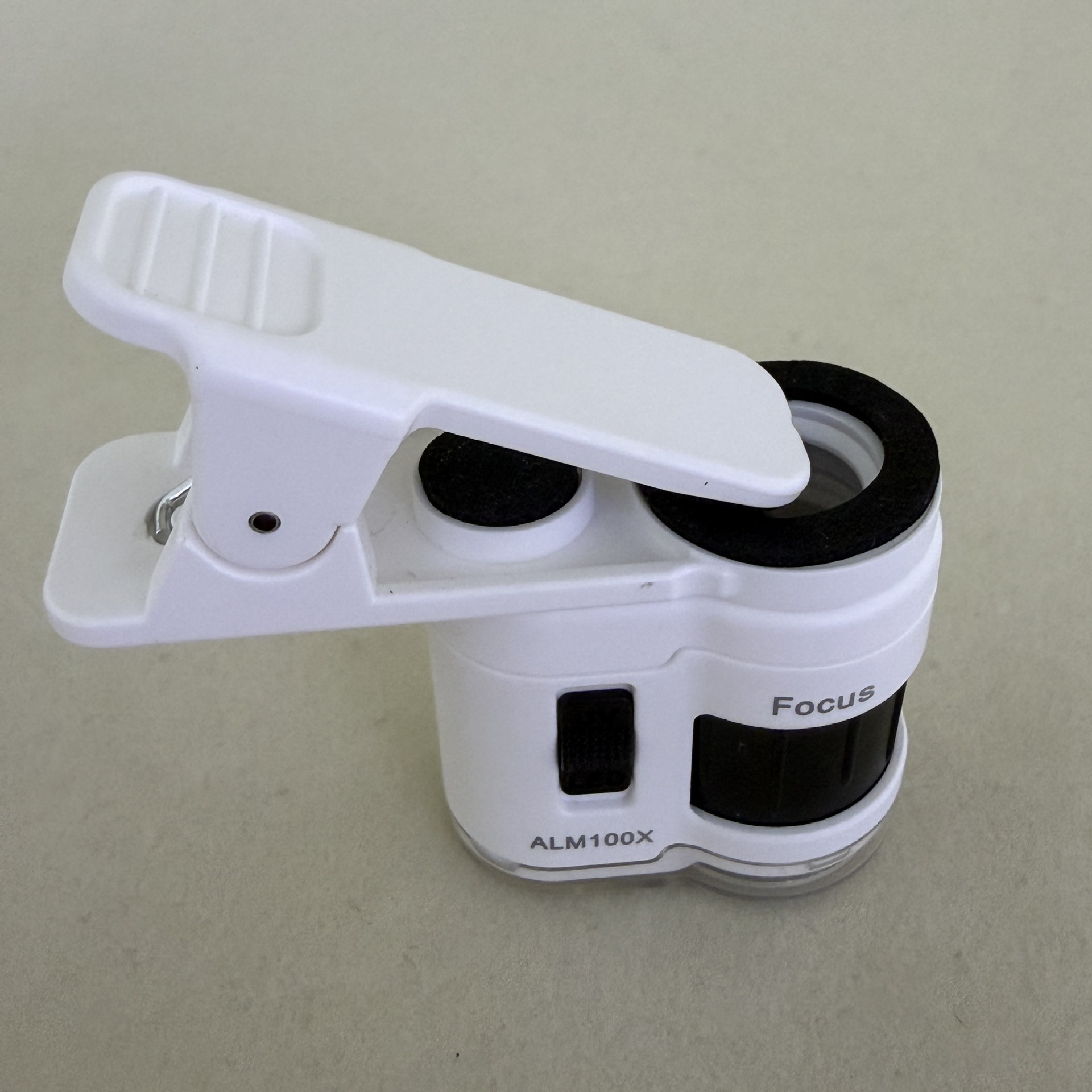 New 100x portable mini microscope with phone holder magnifying glass for jade calligraphy and painting appraisal, equipped with LED ultraviolet light Application Scenario