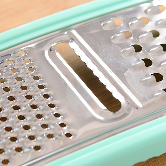 The multi-functional stainless steel vegetable cutter and household manual vegetable grater from Guangdong kitchen are practical and convenient Item Picture