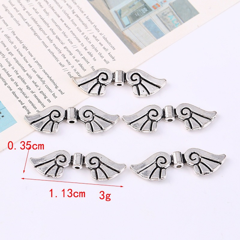Wholesale of retro imitation Thai silver alloy angel wing beads and loose beads DIY bracelet and necklace accessories from the manufacturer Specification image