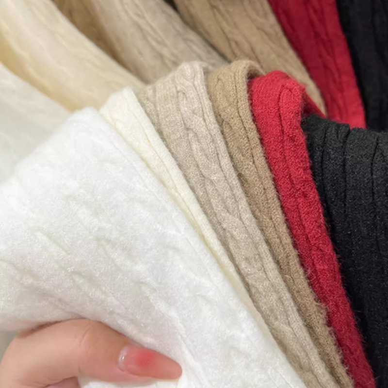 A loose embroidered knitted base layer for women can be paired with a new autumn and winter stylish long-sleeved white sweater with a twist pattern Specification image