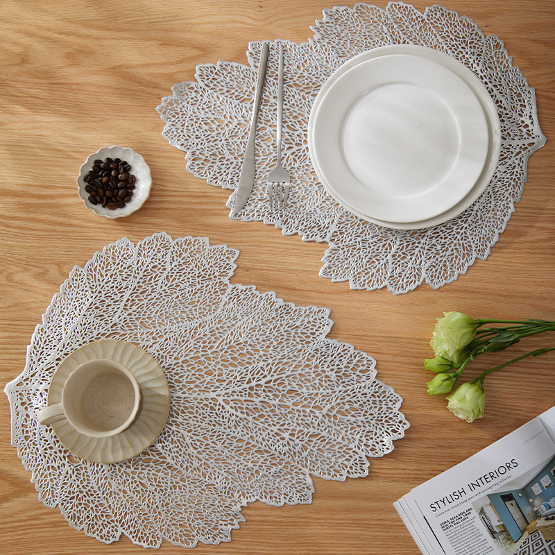 跨境镂空创意设计树叶餐垫轻奢不规则西餐垫隔热PVC烫金注塑桌垫