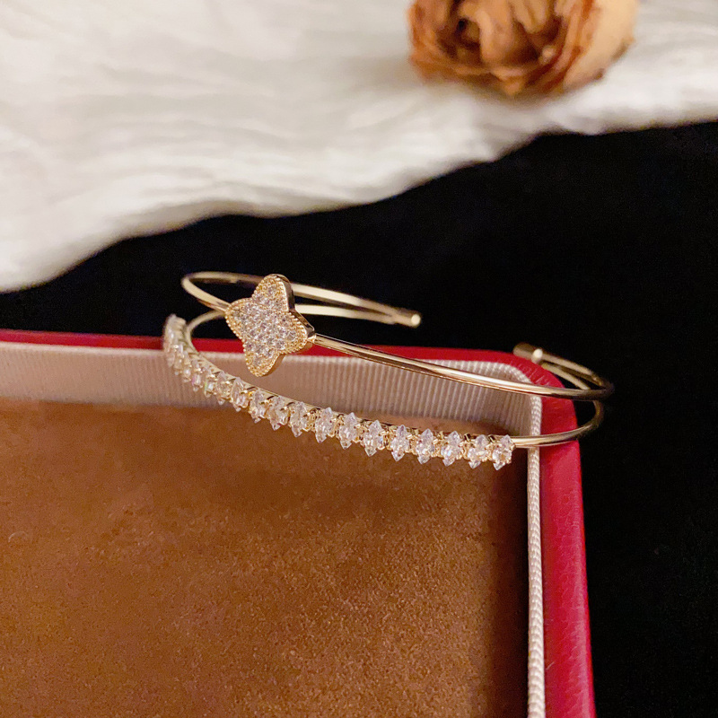 European and American personalized and fashionable cross-border full diamond four-leaf flower double-layer open bracelet, versatile and stylish design sense jewelry wholesale Specification image