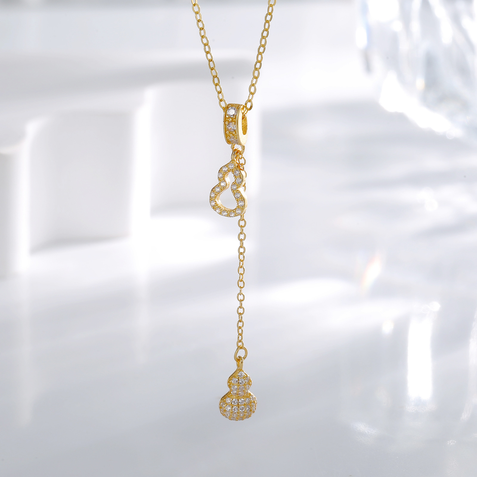 S925 sterling silver tassel golden gourd pendant Girls' necklace with a high-end design, available in a niche and light luxury live stream full figure