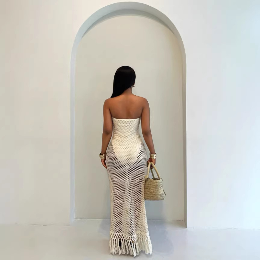 The 2026 cross-border European and American women's beach summer crocheted mesh tassel dress with a false two-piece design details Picture