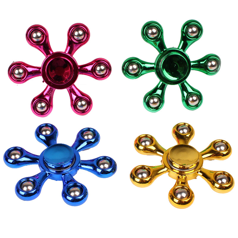 新款电镀钢珠指尖陀螺学生手指六珠指间陀镙儿童地摊玩具工厂批发白底实物图