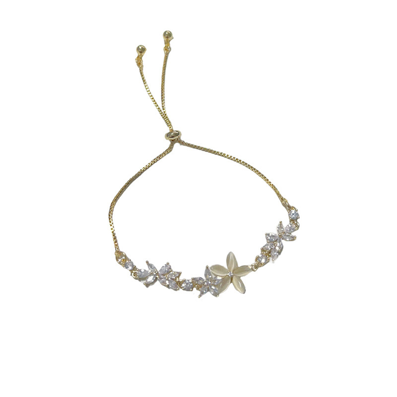 Wholesale of Japanese and Korean fashion light luxury style zircon cat's eye stone flower pull-out bracelets, personalized, versatile and super dazzling jewelry Item Picture