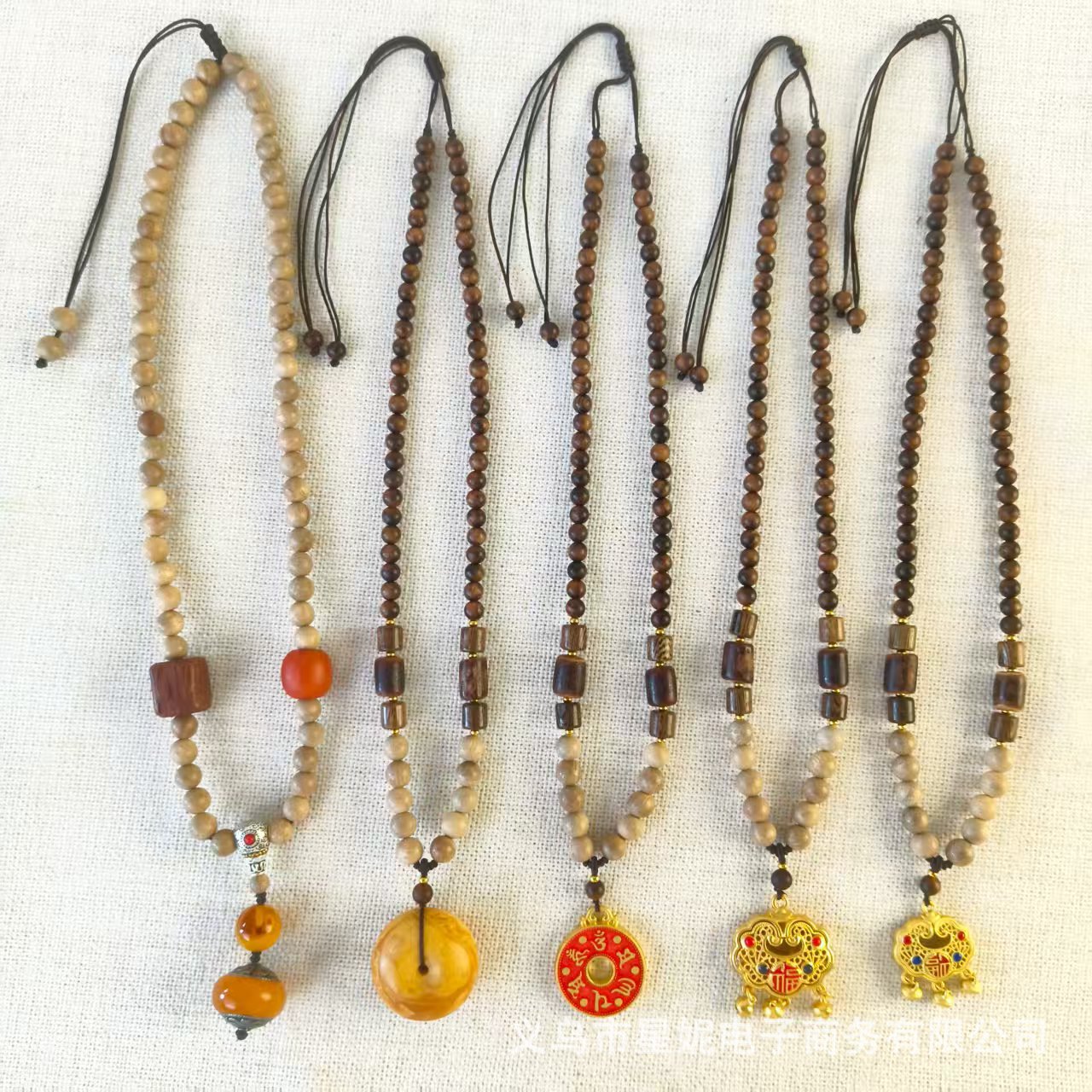 Five styles of crystal incense beads, handcrafted wooden beads and pendants, available in a variety of colors including light brown and dark brown