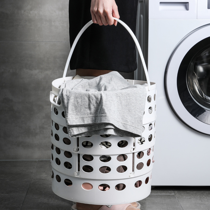 The dirty clothes basket can be hung in the home bathroom to store dirty clothes. It is a zoned storage basket and a wall-mounted dirty clothes basket in the bathroom Application Scenario