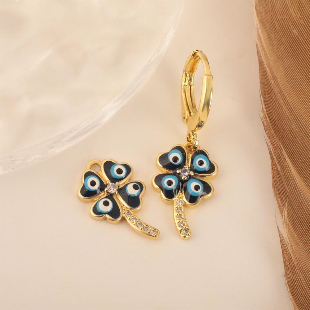 European and American INS niche four-leaf clover earrings, copper-plated 18K gold with oil drops, zircon Devil's eye geometric earrings for women wholesale
