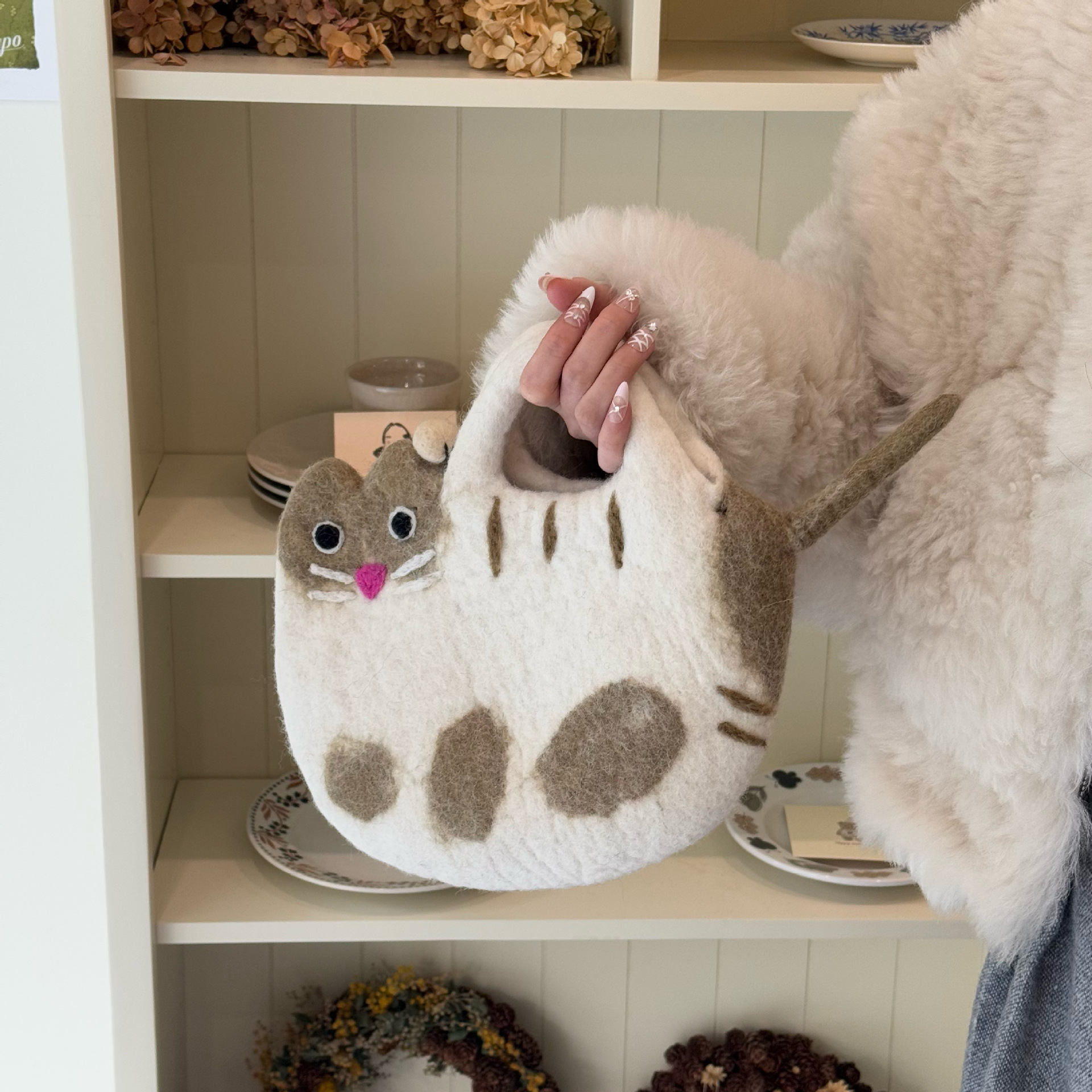 尼泊尔羊毛毡可爱猫咪手拎包手提包ins风韩系卡通儿童女生通勤包