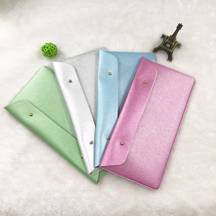 厂家直销批发奶嘴扣长款钱票夹定制pu皮女士钱包夹横款亮皮定做