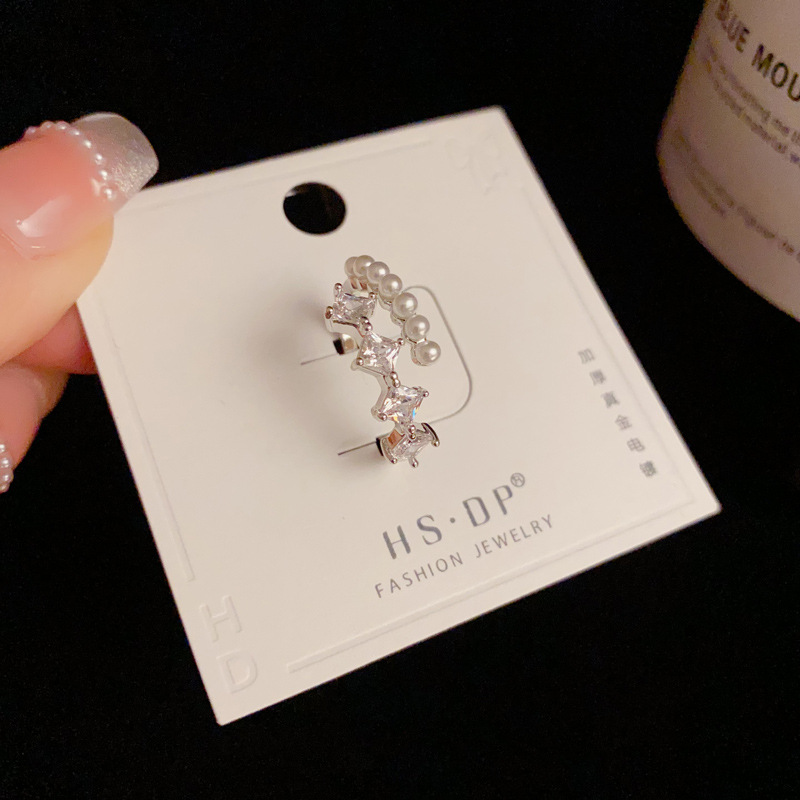 The light luxury slightly inlaid star pearl open ring exudes a sense of sophistication for women. The adjustable index finger ring is a simple and niche jewelry details Picture