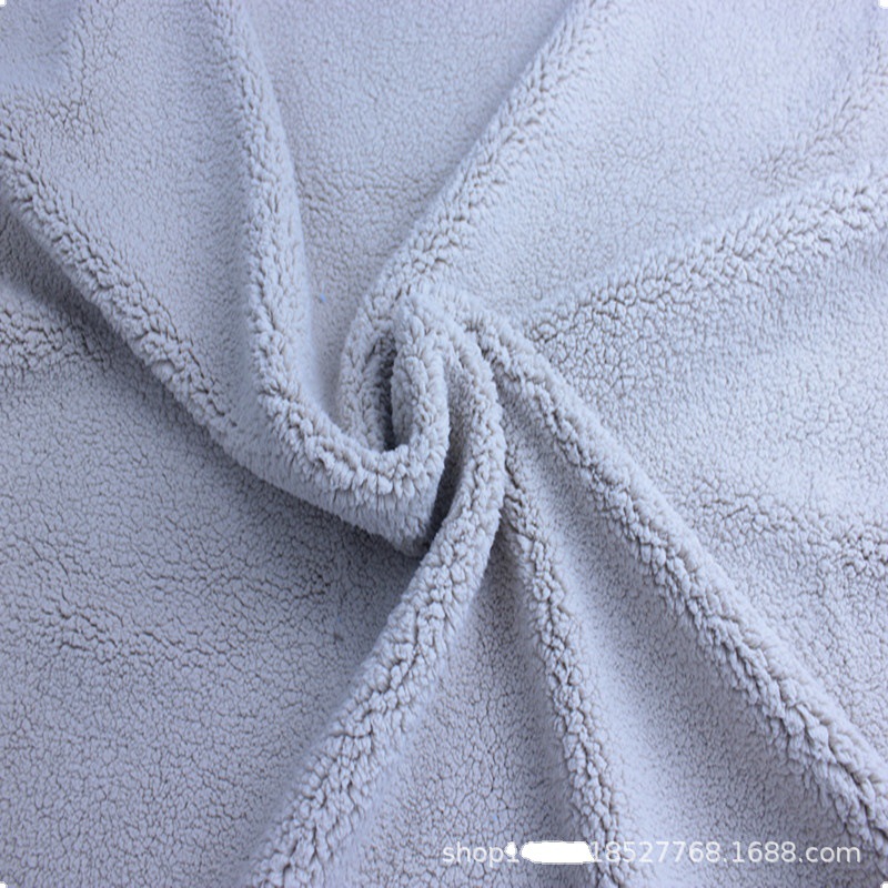 现货舒棉绒颗粒绒超细一体绒可用于宝宝空调鞋玩具抱枕布料批发白底实物图