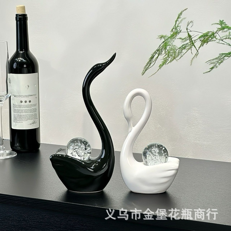 Black and white color-matched couple swan ceramic decorative piece with crystal ball, modern and simple living room TV cabinet home decoration