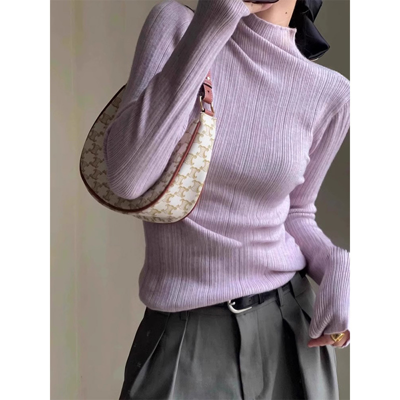 A light purple semi-high neck slim-fit innerwear with a knitted sweater for women in the spring of 2026 is a stylish and unique thin base layer A light purple semi-high neck slim-fit innerwear with a knitted sweater for women in the spring of 2026 is a stylish and unique thin base layer