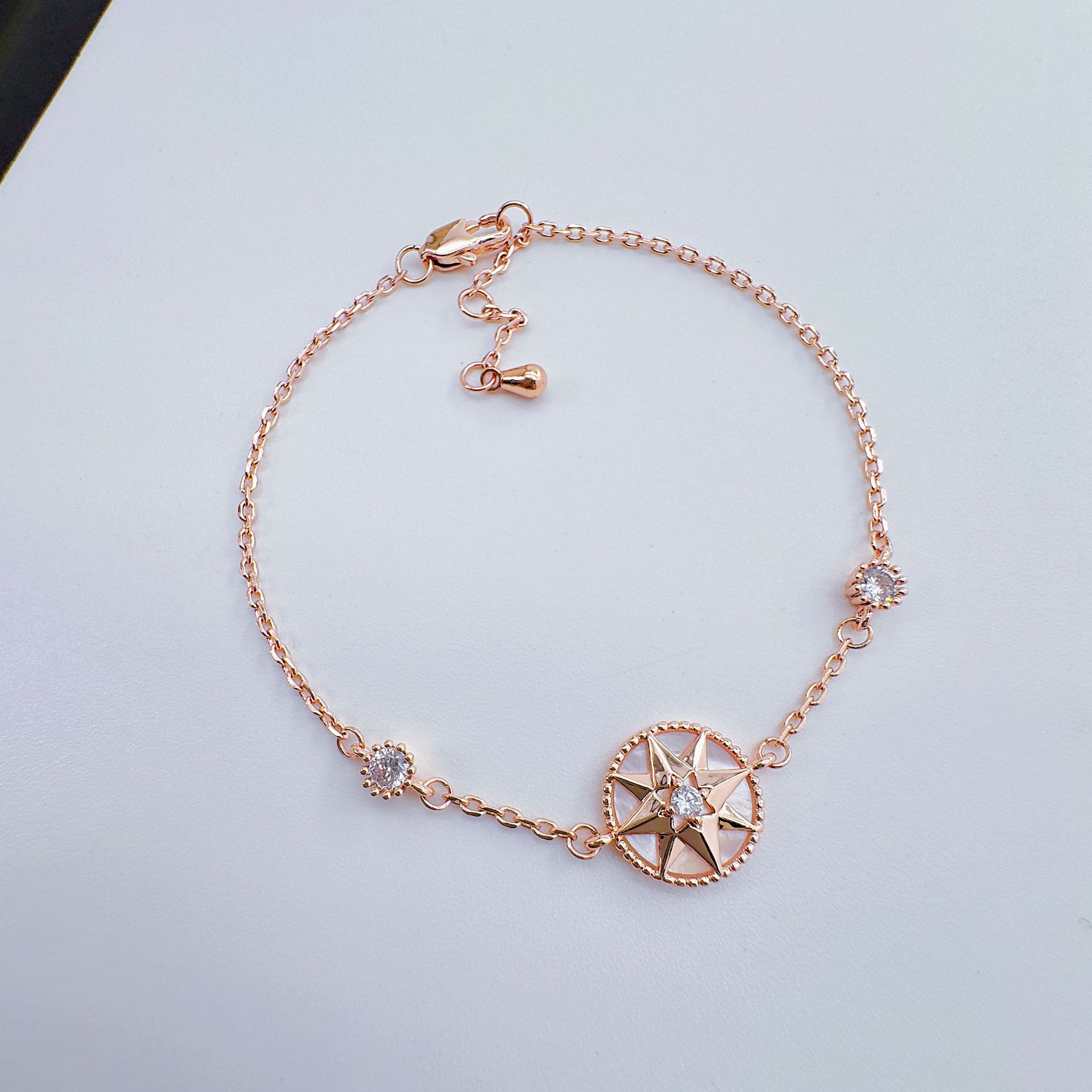 柏伶饰品新款镶钻八芒星罗盘贝母手链金色轻奢百搭小众简约手链女