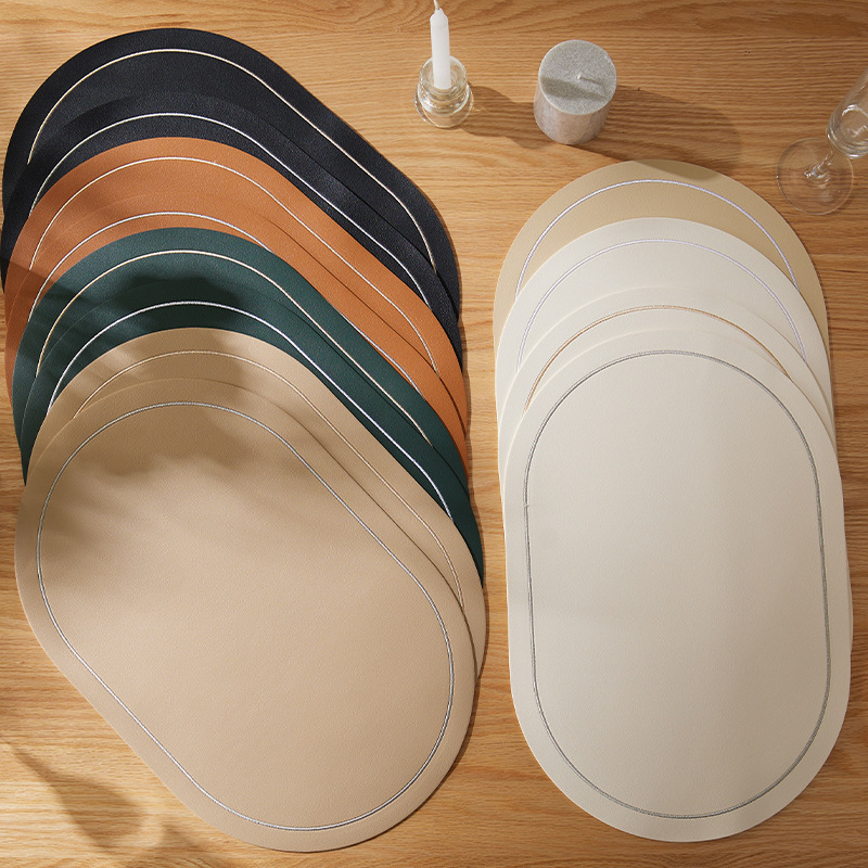 Elliptical Napa pattern leather placemats are waterproof, oil-proof and heat-insulating. They are suitable for hotels, restaurants and home use as light luxury table MATS details Picture