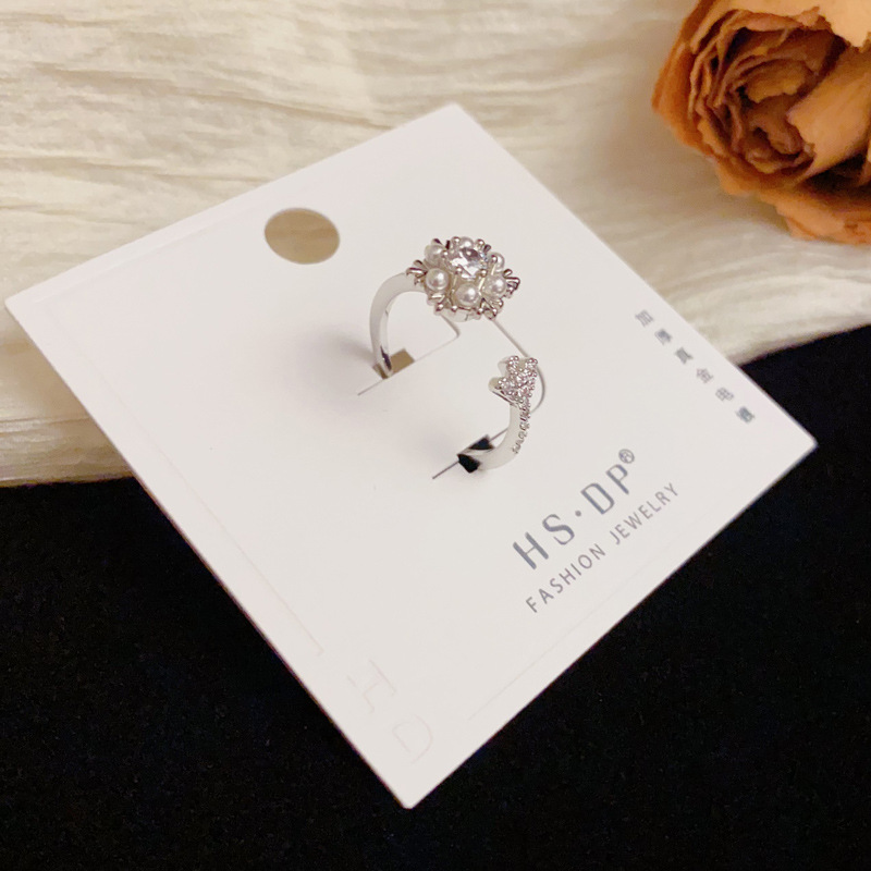 Wholesale of niche, exquisite, fashionable, versatile, super shiny diamond-encrusted pearl snowflake open-mouth rings with a light luxury and simple design sense details Picture