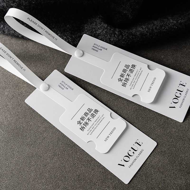 新款防拆一次性吊牌设计个性商标标签订做网红女装挂牌高级感吊卡产品图