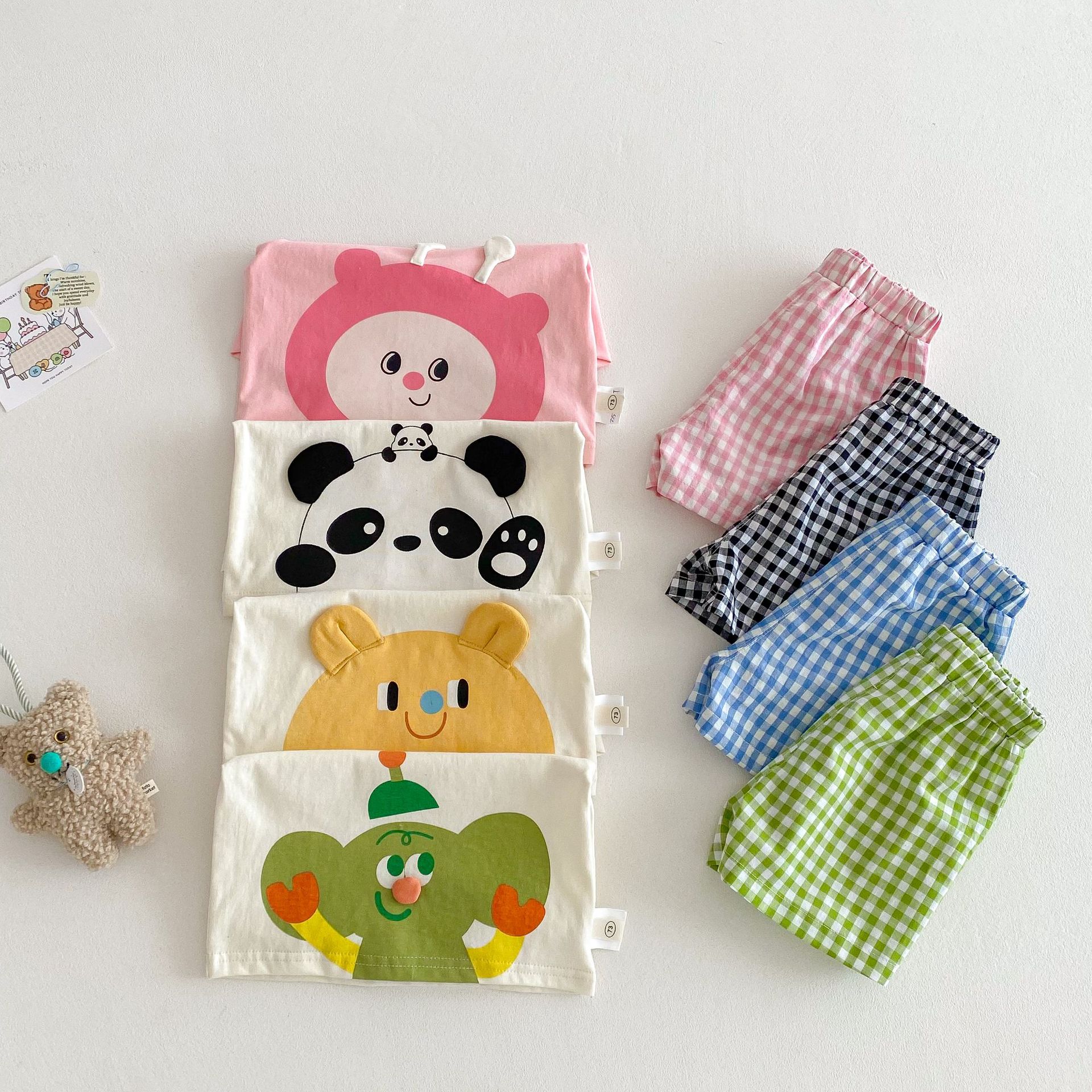 Children's cartoon set, Little Left and Little Right, summer girls' stylish short-sleeved T-shirt, thin boys' plaid shorts two-piece set details Picture