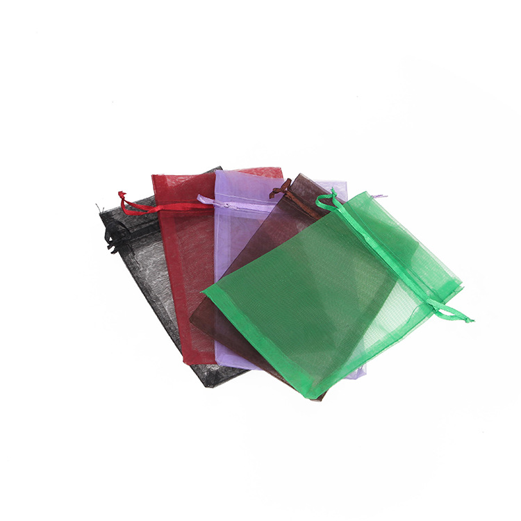 Transparent net solid color large storage bag, wedding candy bag, drawstring silk bag, pull-out creative small snow yarn drawstring bag Item Picture