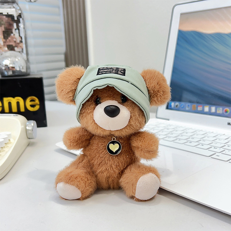 Wholesale of hats, bear dolls, pendants, plush small dolls, bags, keychains, dolls, cute toys, schoolbags and pendants details Picture