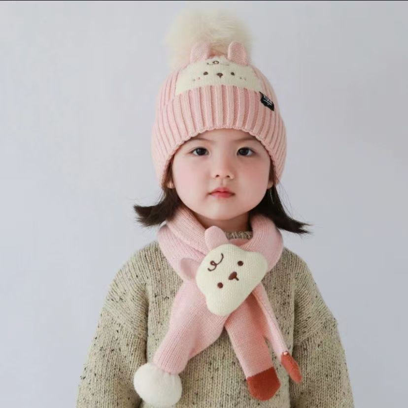 Wholesale of one-piece children's hats, scarves, cartoon autumn and winter ear-protecting knitted warm and cute woolen hats for boys, girls and babies at street stalls
