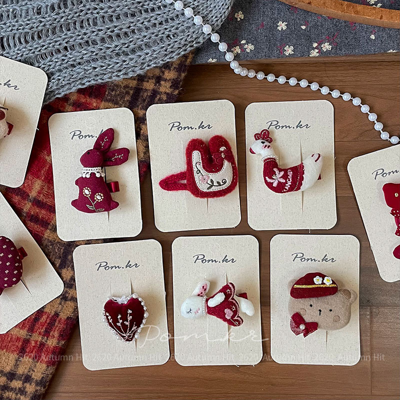 New Korean-style red fabric cartoon hairpins are sweet and handcrafted for children. They feature side breakdowns and bangs for girls. Pom.kr wine red fabric cute and fun hairpins, bear apples, and multiple styles, making them adorable for girls in autumn and winter Specification image