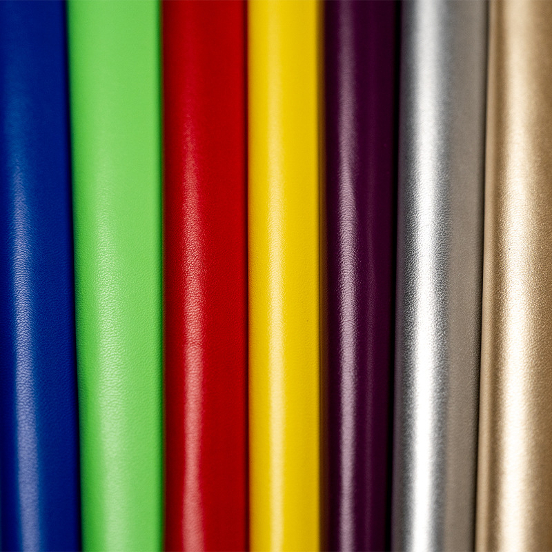 批发肤感柔软垂感pu人造革弹力针织时尚男女服装童装皮革面料产品图