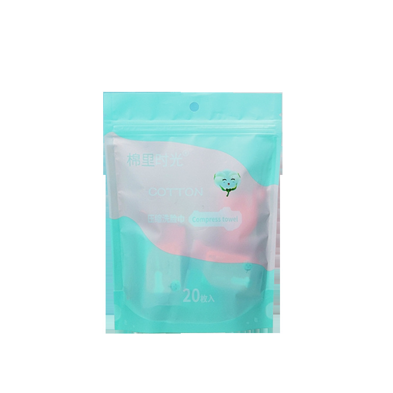 一次性压缩毛巾/卡通压缩毛巾/酒店一次性浴巾/压缩洗脸巾/压缩毛巾白底实物图